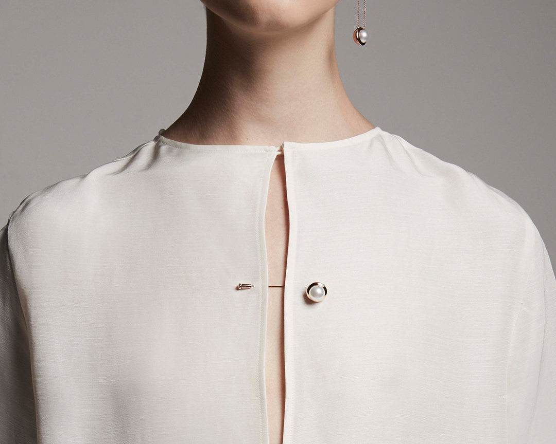 Portmanteau lapel pin from the State Property Unfold collection