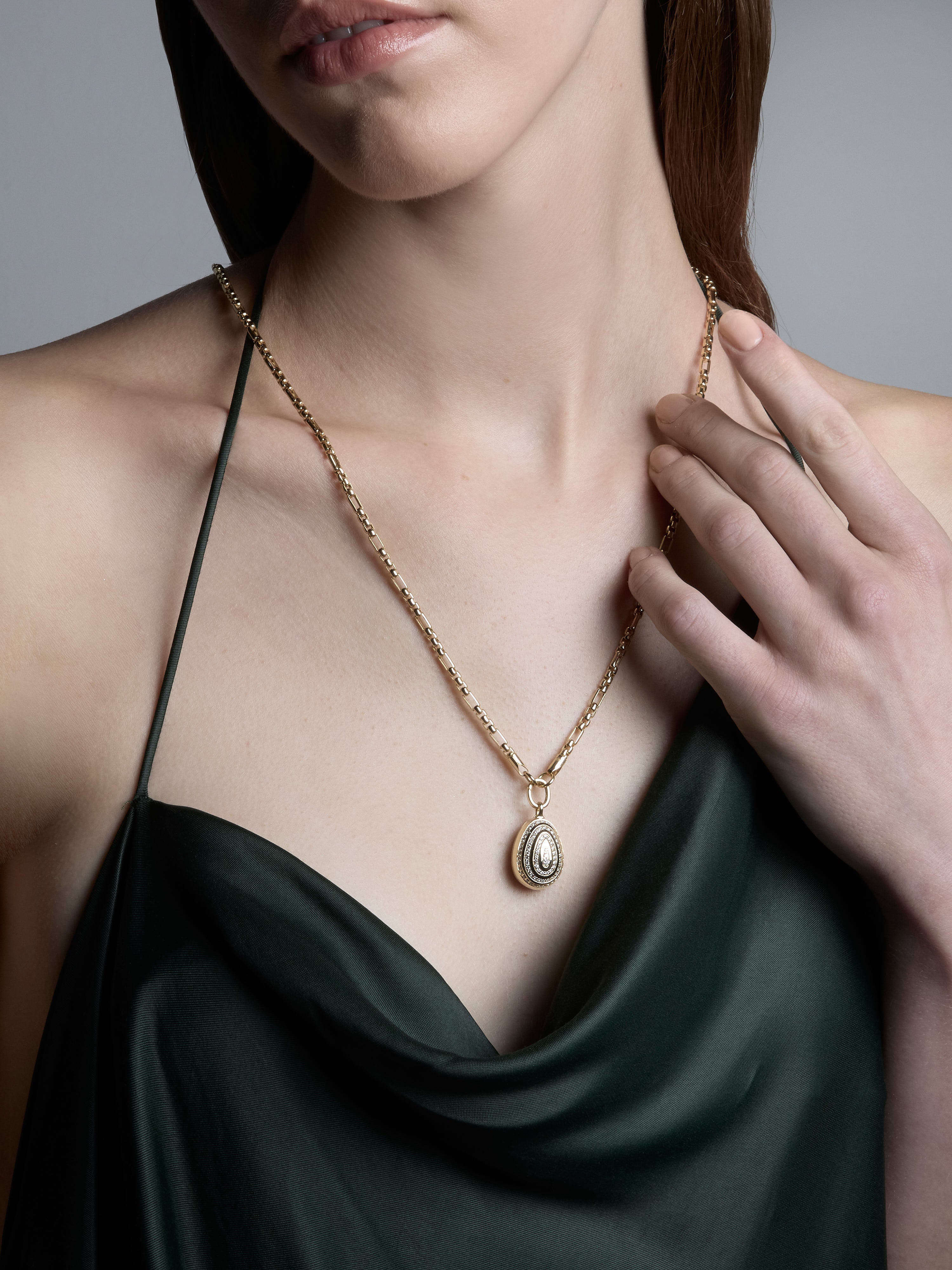 Cosmic Egg Diamond Orbit Locket Pendant