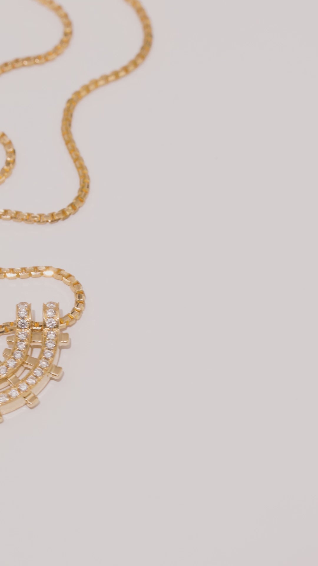 Load video: Railroad Pavè Arc Pendant